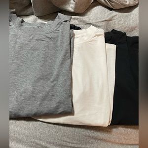 3 Lululemon t-shirts.